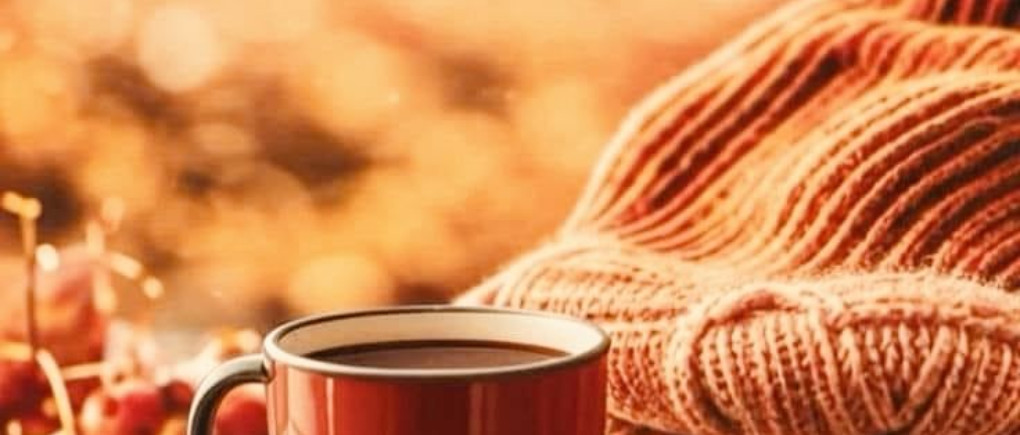 Fluffy orange blanket, a cup of coffee, autumn vibe