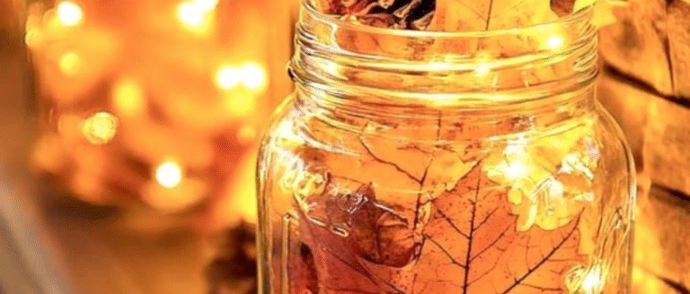 A candle with autumn leaves